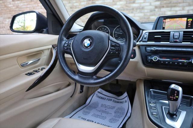 used 2014 BMW 335 car, priced at $11,997