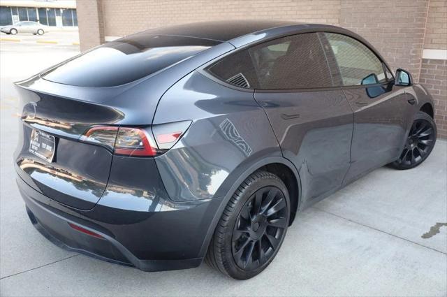 used 2024 Tesla Model Y car, priced at $30,997