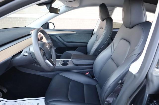 used 2024 Tesla Model Y car, priced at $30,997