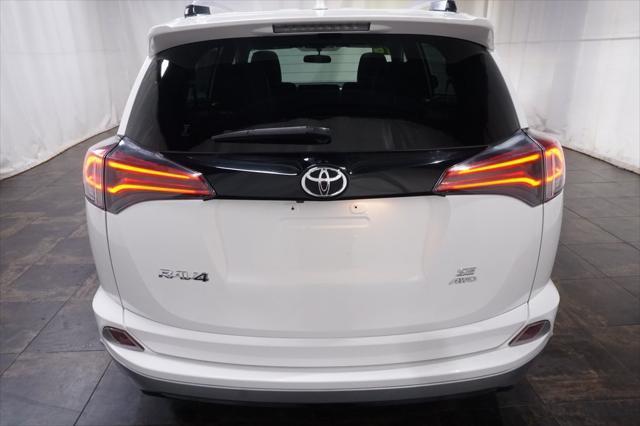 used 2016 Toyota RAV4 car, priced at $14,990