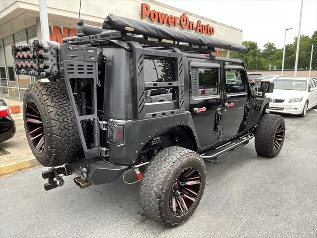 used 2010 Jeep Wrangler Unlimited car, priced at $19,973