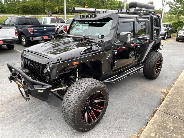 used 2010 Jeep Wrangler Unlimited car, priced at $19,973