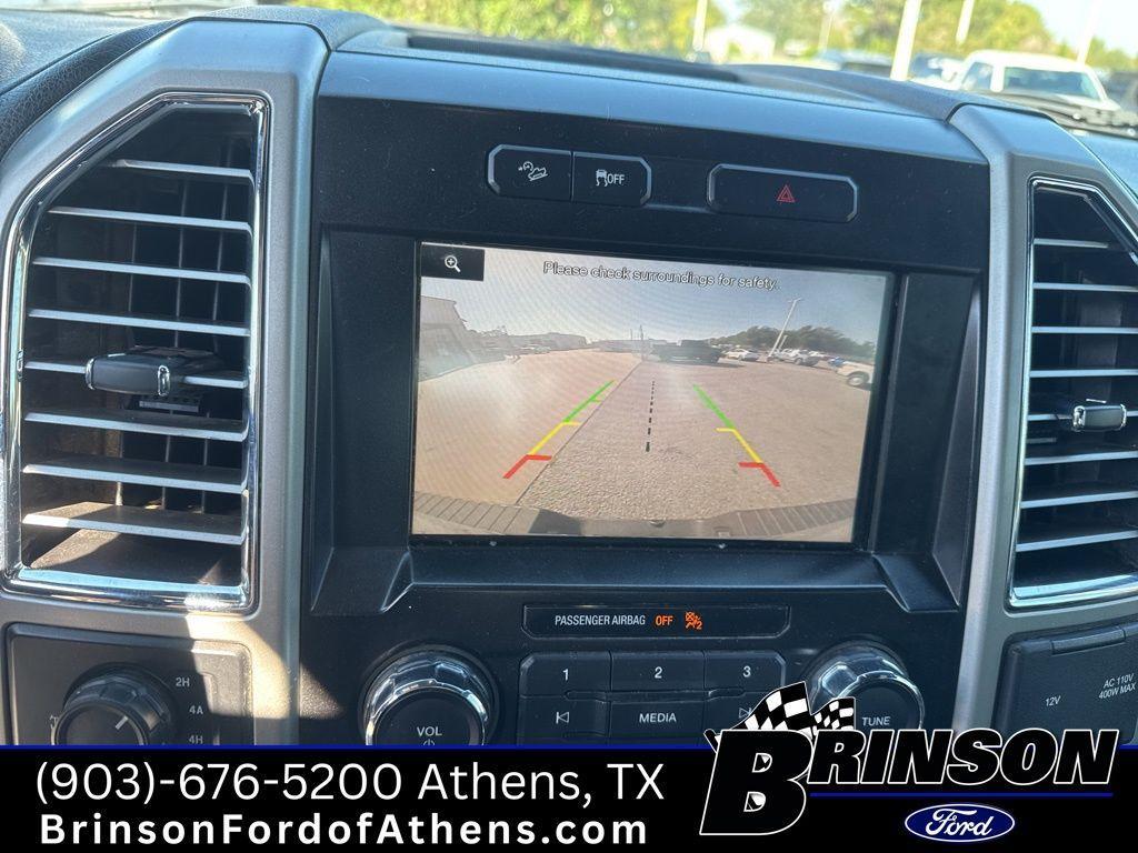 used 2015 Ford F-150 car, priced at $23,301