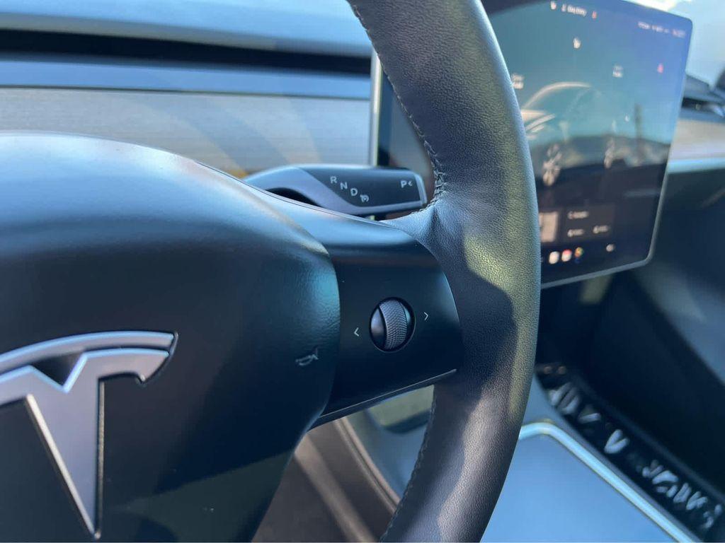 used 2023 Tesla Model Y car, priced at $30,995