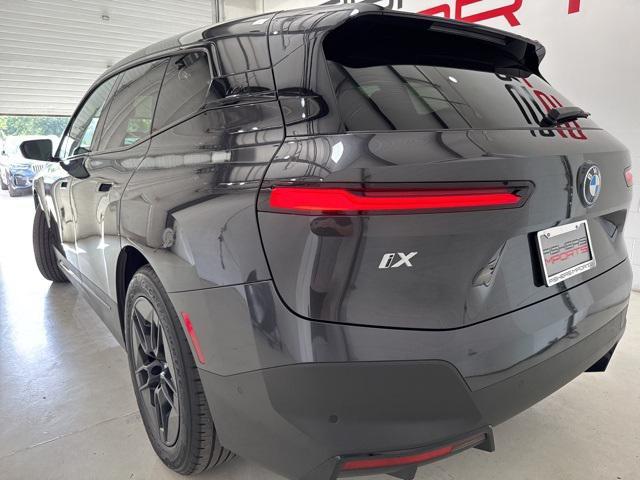 used 2024 BMW iX car, priced at $58,500
