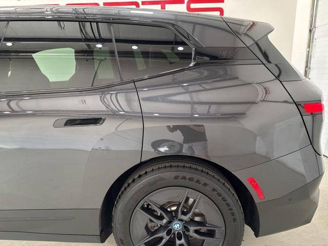 used 2024 BMW iX car, priced at $58,500