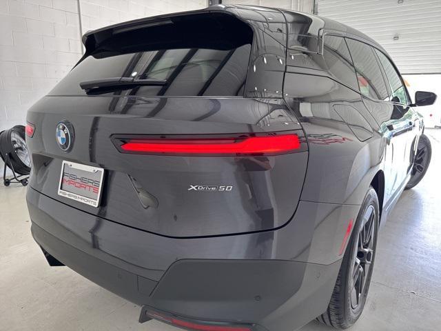 used 2024 BMW iX car, priced at $58,500