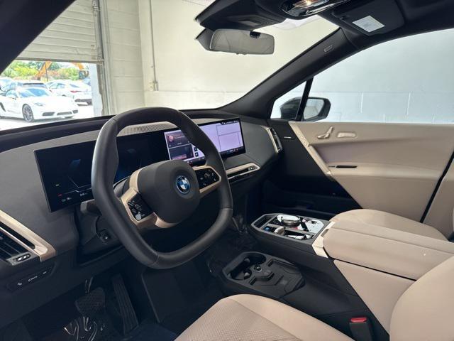 used 2024 BMW iX car, priced at $58,500