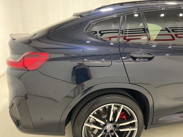 used 2023 BMW X4 M car, priced at $70,850
