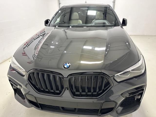 used 2022 BMW X6 car, priced at $54,910
