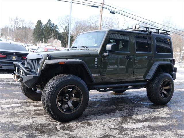 used 2015 Jeep Wrangler Unlimited car, priced at $19,999