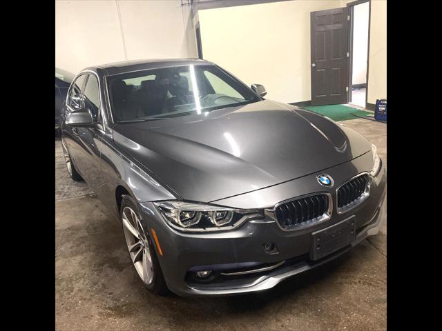 used 2018 BMW 330 car, priced at $19,600