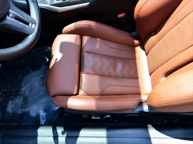 used 2024 BMW M4 car, priced at $85,000