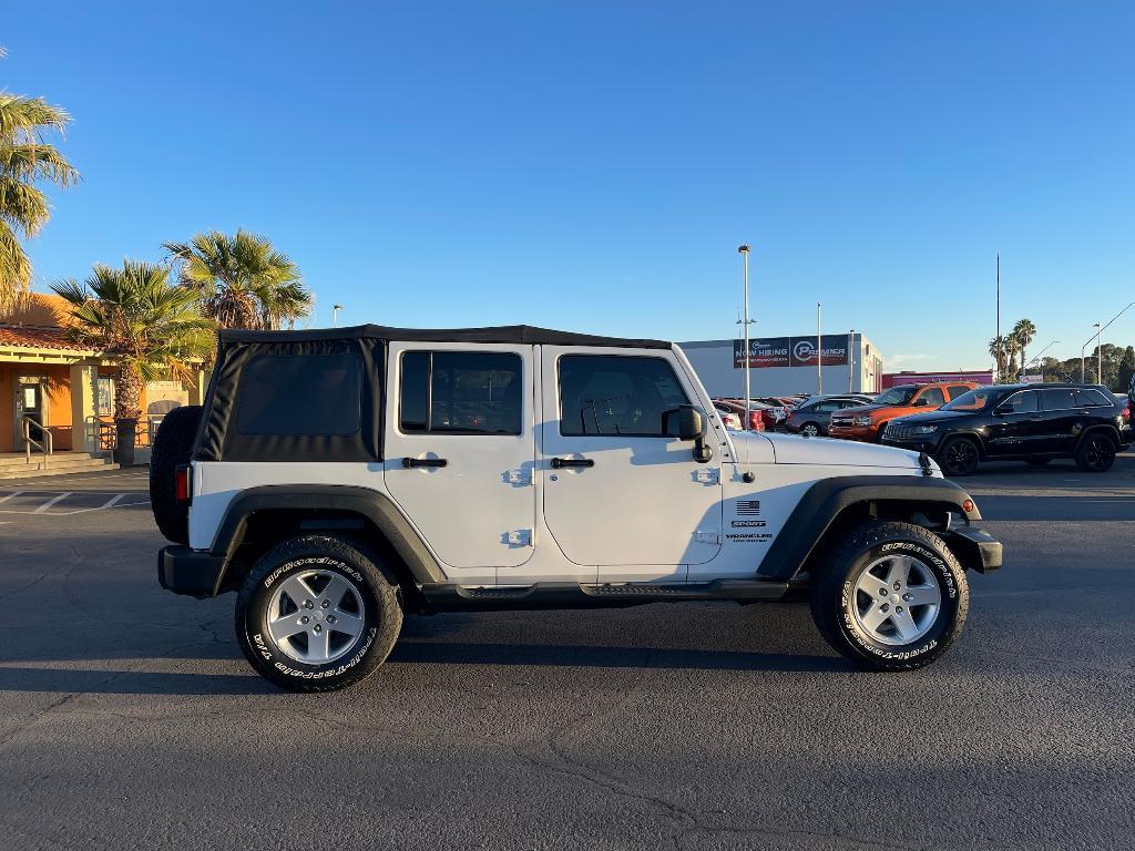 used 2014 Jeep Wrangler Unlimited car, priced at $14,495