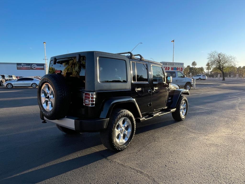 used 2013 Jeep Wrangler Unlimited car, priced at $16,900