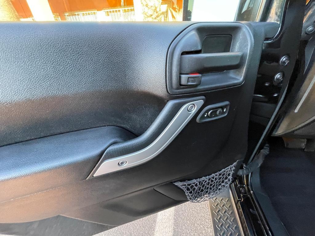 used 2013 Jeep Wrangler Unlimited car, priced at $16,900