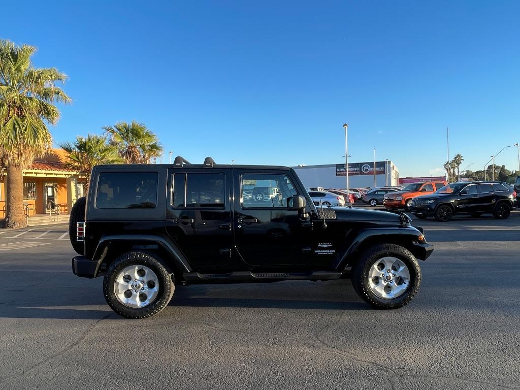 used 2013 Jeep Wrangler Unlimited car, priced at $16,900