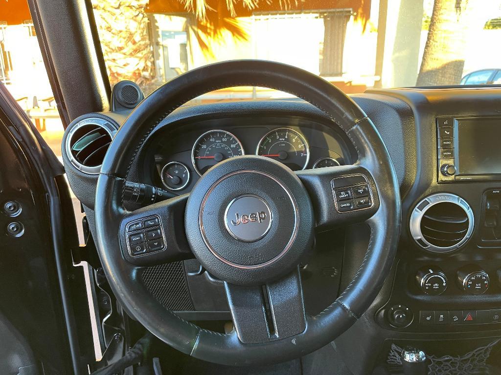 used 2013 Jeep Wrangler Unlimited car, priced at $16,900