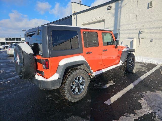 used 2015 Jeep Wrangler Unlimited car, priced at $19,164