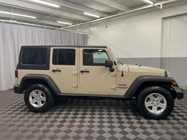 used 2016 Jeep Wrangler Unlimited car, priced at $20,623
