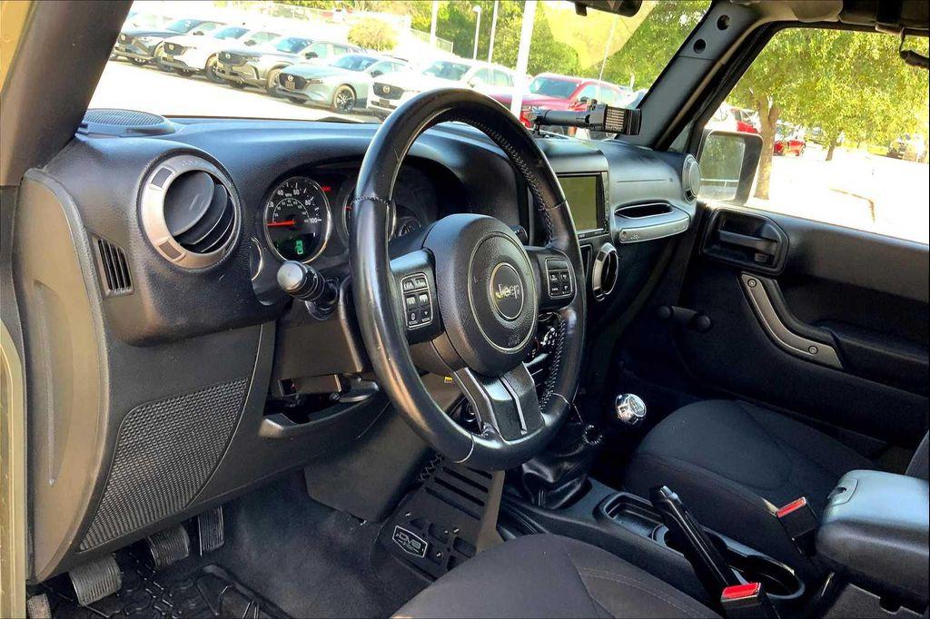 used 2015 Jeep Wrangler Unlimited car, priced at $13,990