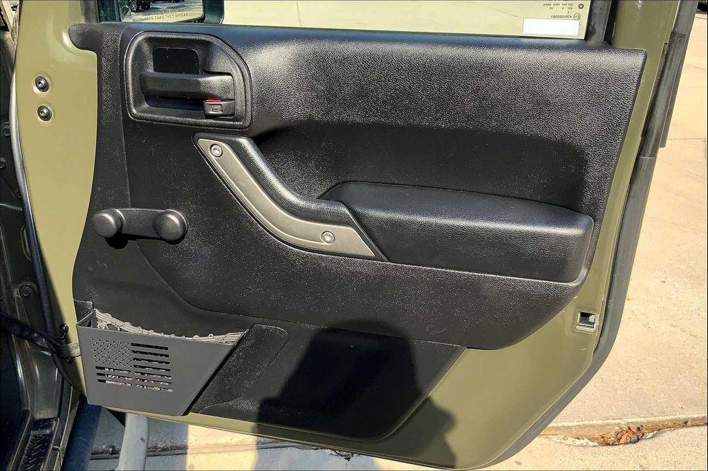 used 2015 Jeep Wrangler Unlimited car, priced at $13,990