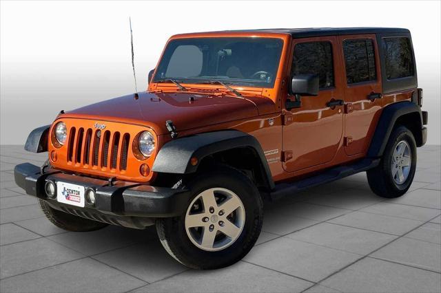 used 2011 Jeep Wrangler Unlimited car, priced at $13,990