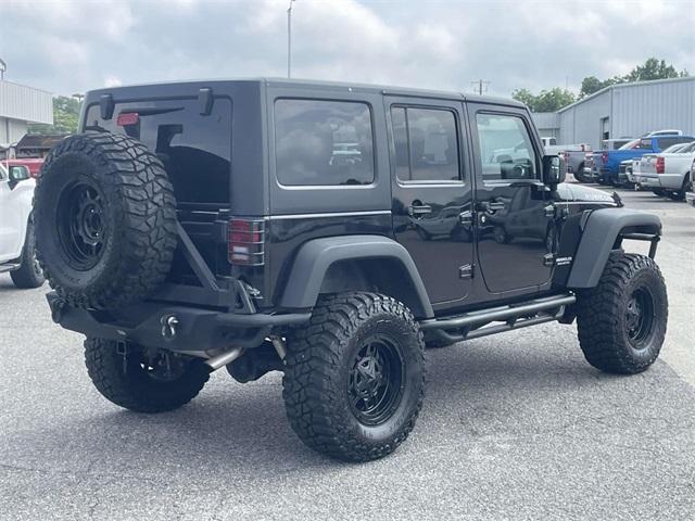 used 2013 Jeep Wrangler Unlimited car, priced at $22,950