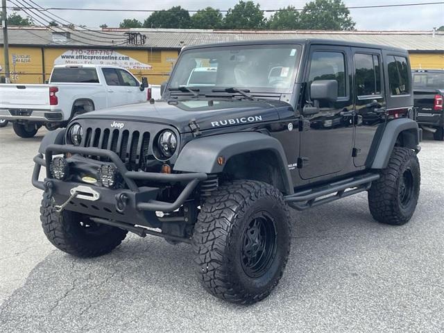 used 2013 Jeep Wrangler Unlimited car, priced at $22,950