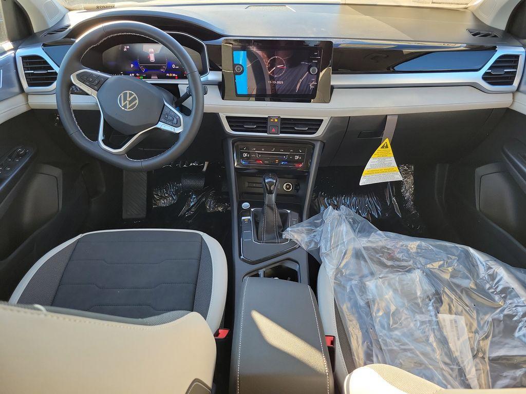 new 2025 Volkswagen Taos car, priced at $27,027