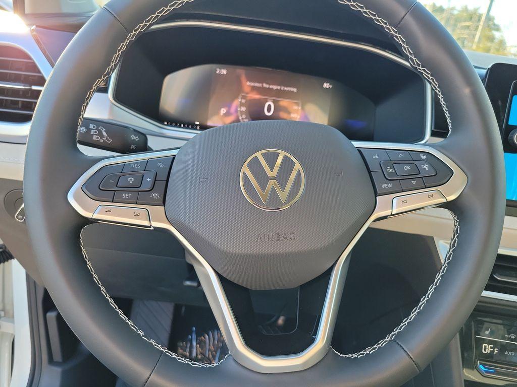 new 2025 Volkswagen Taos car, priced at $27,027