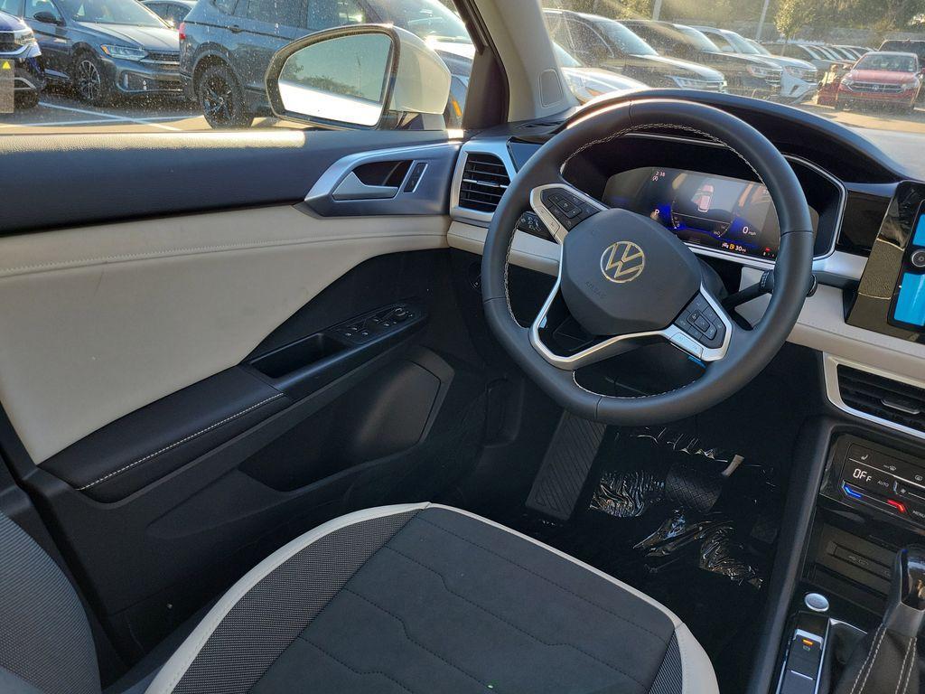 new 2025 Volkswagen Taos car, priced at $27,027