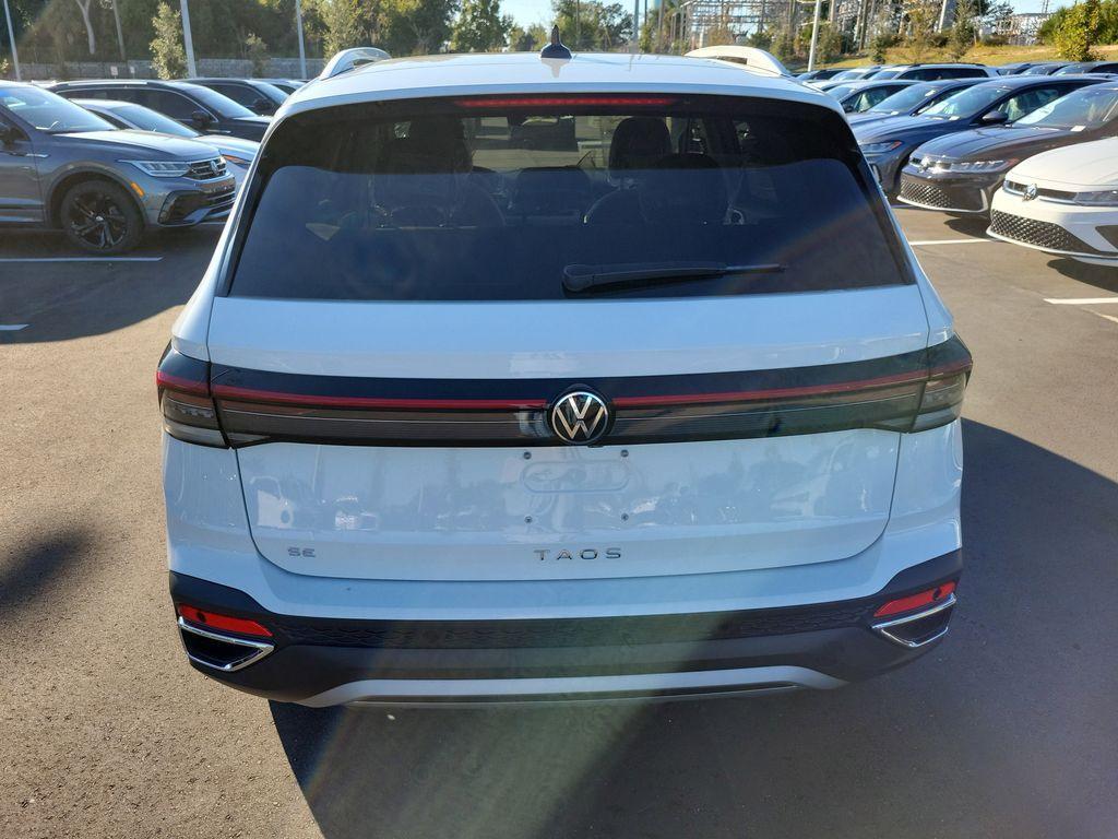 new 2025 Volkswagen Taos car, priced at $27,027