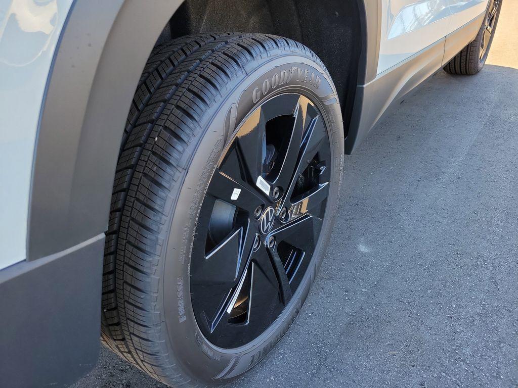 new 2025 Volkswagen Taos car, priced at $27,027