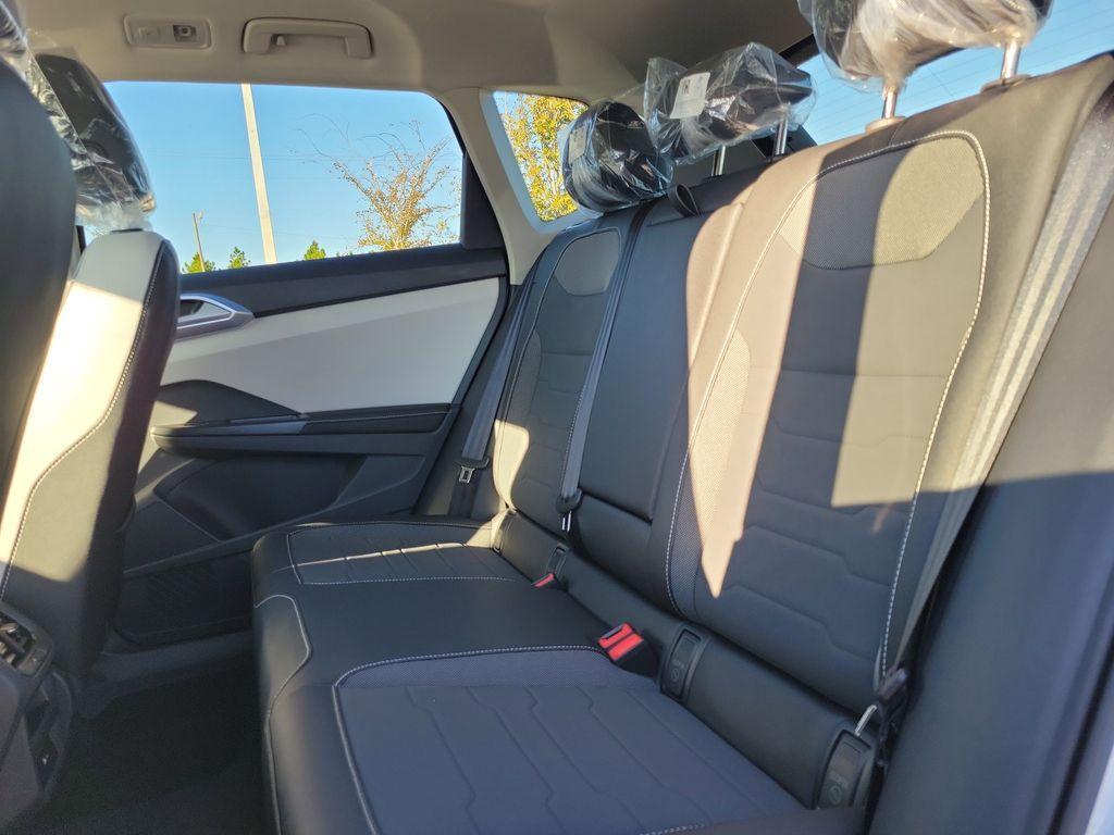new 2025 Volkswagen Taos car, priced at $27,027