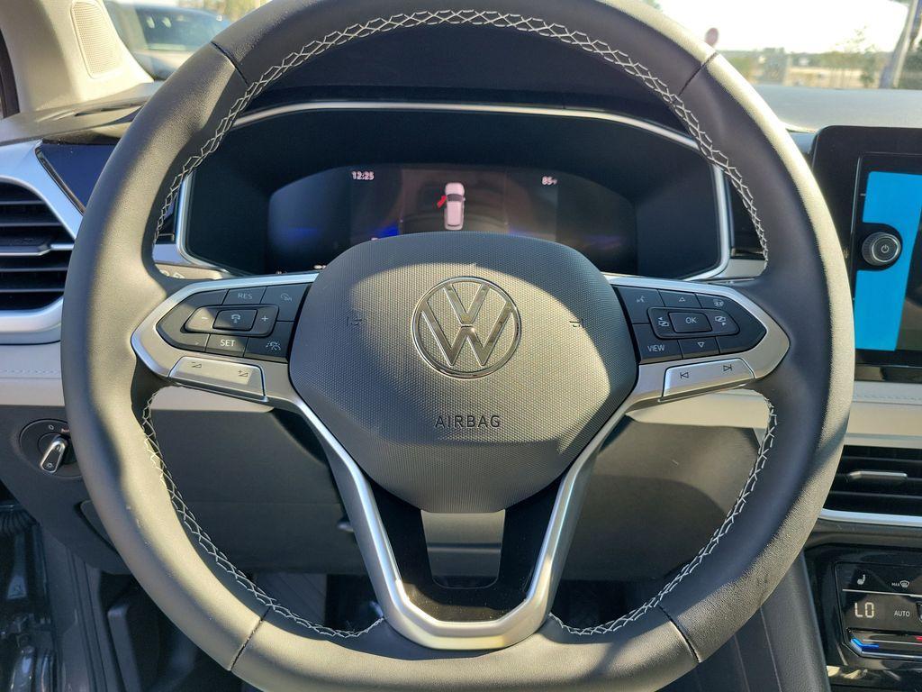new 2025 Volkswagen Taos car, priced at $27,027