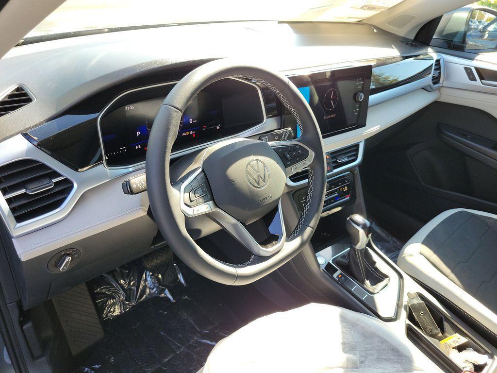 new 2025 Volkswagen Taos car, priced at $27,027