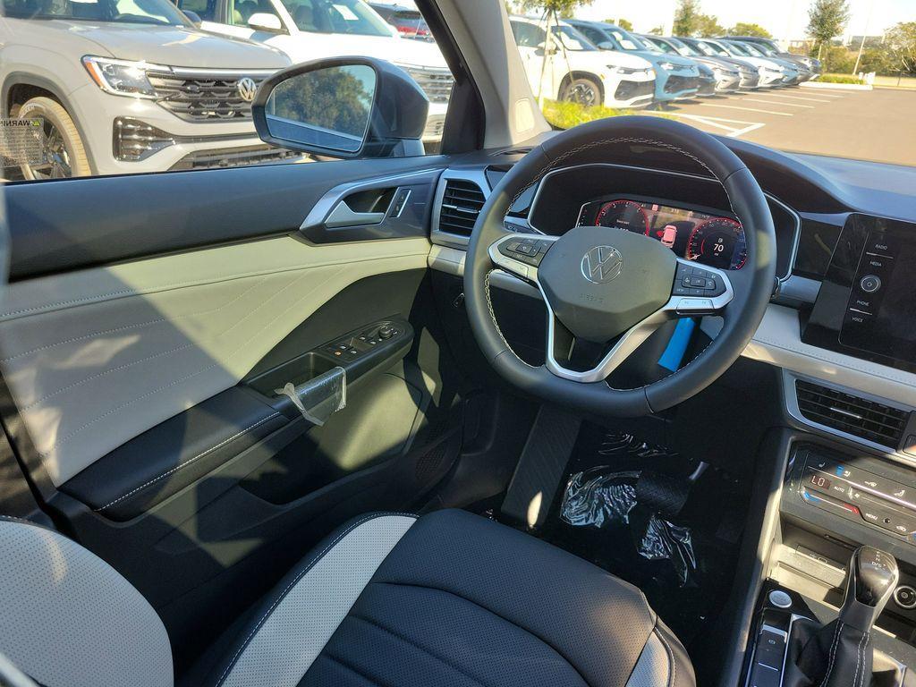 new 2025 Volkswagen Taos car, priced at $32,579