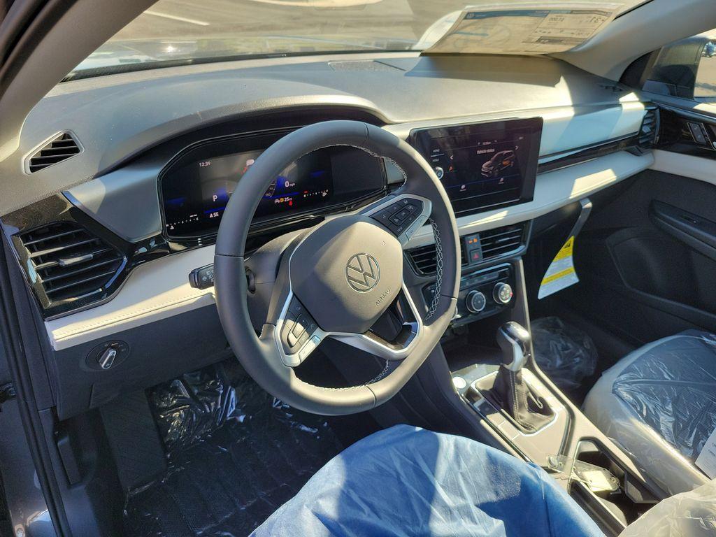 new 2025 Volkswagen Taos car, priced at $24,348
