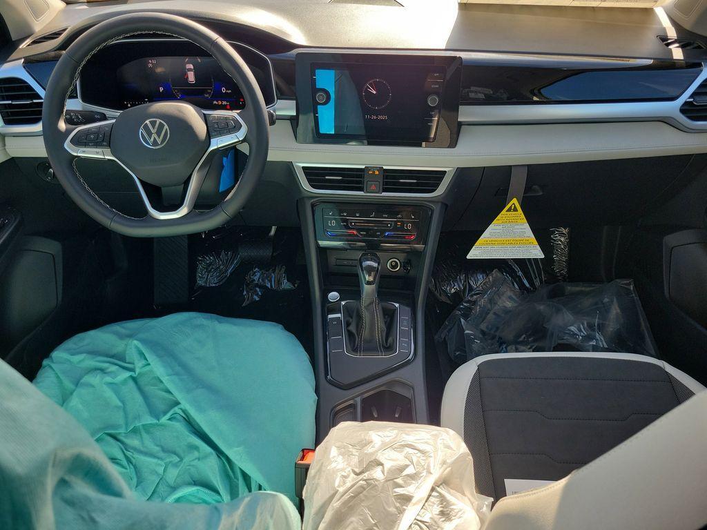 new 2025 Volkswagen Taos car, priced at $27,027