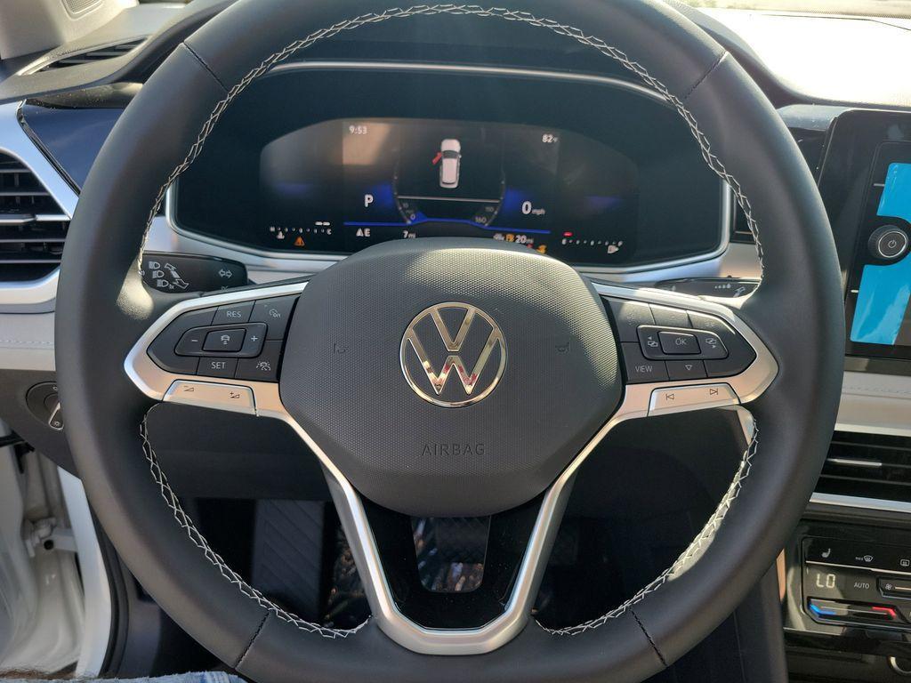new 2025 Volkswagen Taos car, priced at $27,027