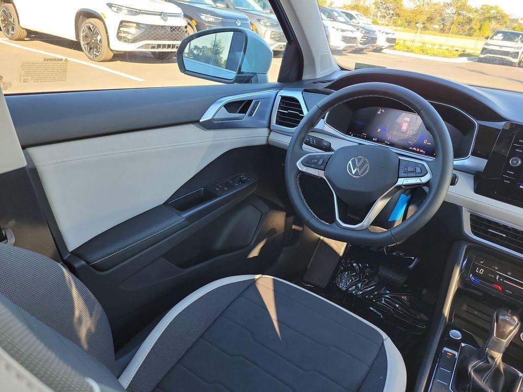 new 2025 Volkswagen Taos car, priced at $27,464