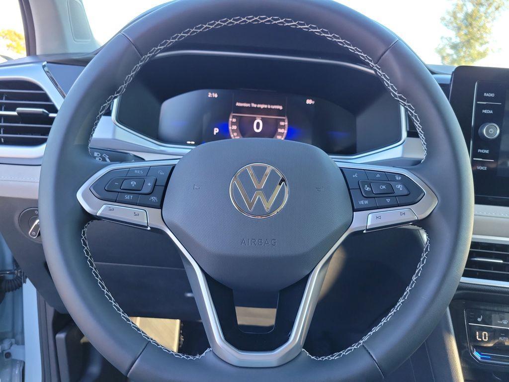 new 2025 Volkswagen Taos car, priced at $27,464