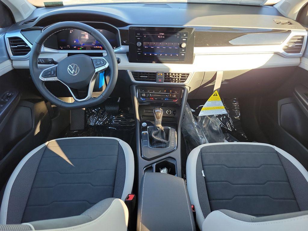 new 2025 Volkswagen Taos car, priced at $27,464