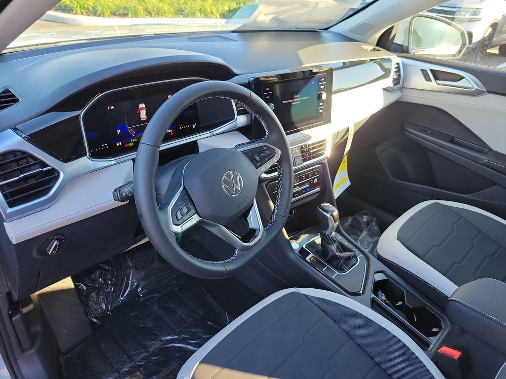 new 2025 Volkswagen Taos car, priced at $27,464