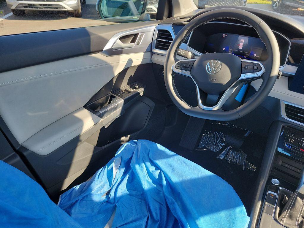new 2025 Volkswagen Taos car, priced at $27,027