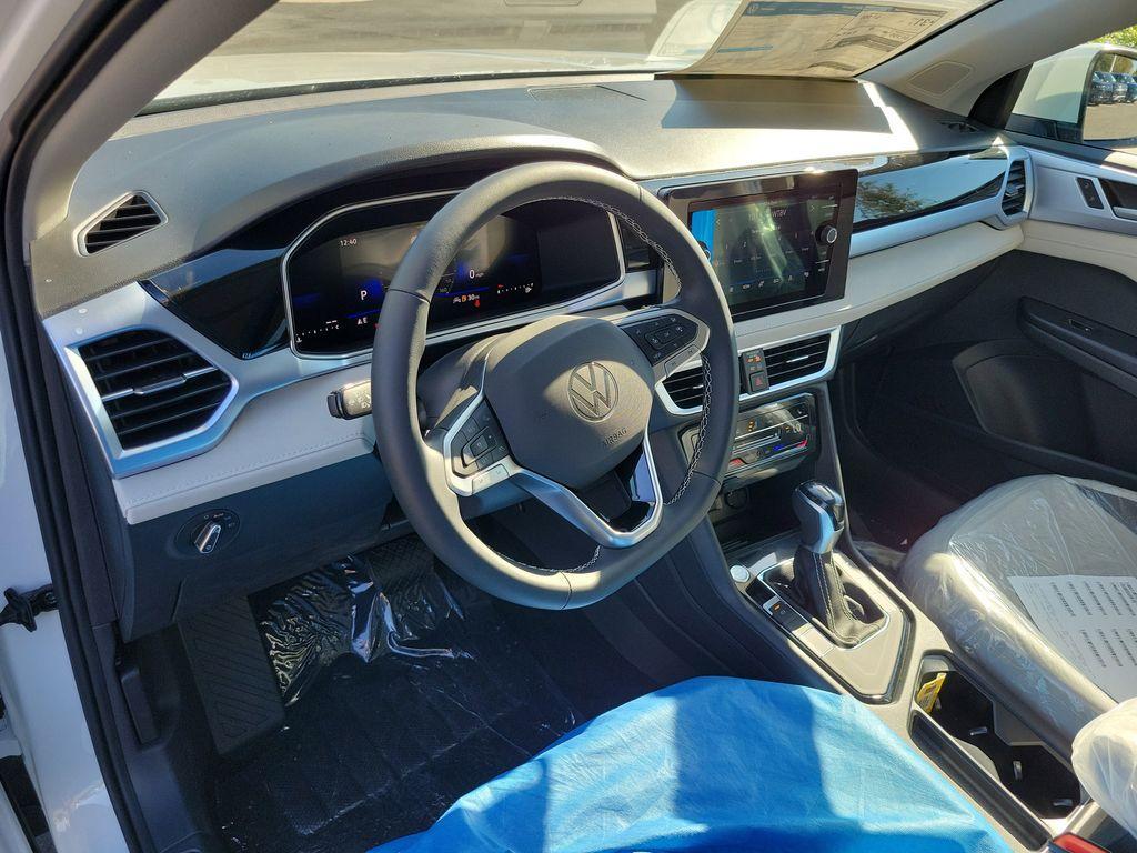 new 2025 Volkswagen Taos car, priced at $27,027