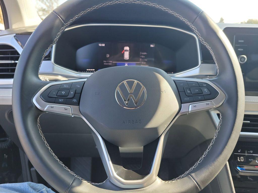 used 2025 Volkswagen Taos car, priced at $23,495