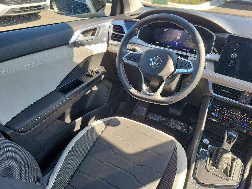 used 2025 Volkswagen Taos car, priced at $23,495