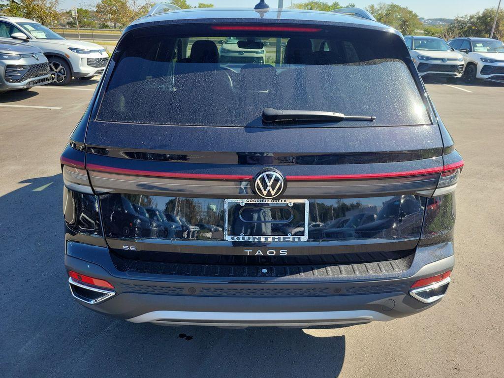 used 2025 Volkswagen Taos car, priced at $23,495